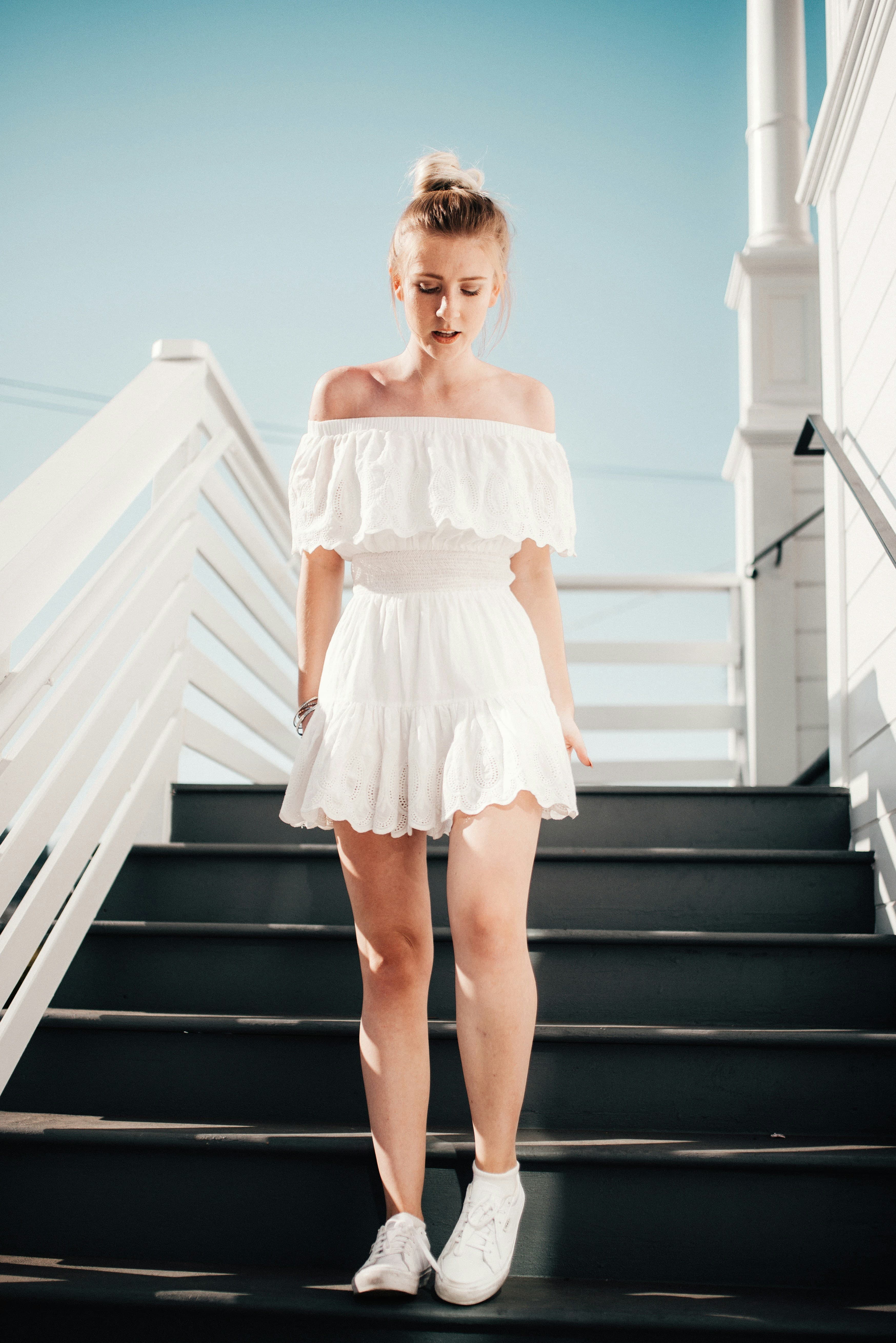 Pale silk wrap dress worn standing
